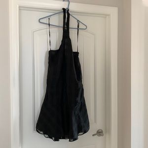 Black lined halter cocktail dress. Worn once for NYE.